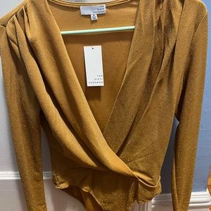 Shimmery gold bodysuit